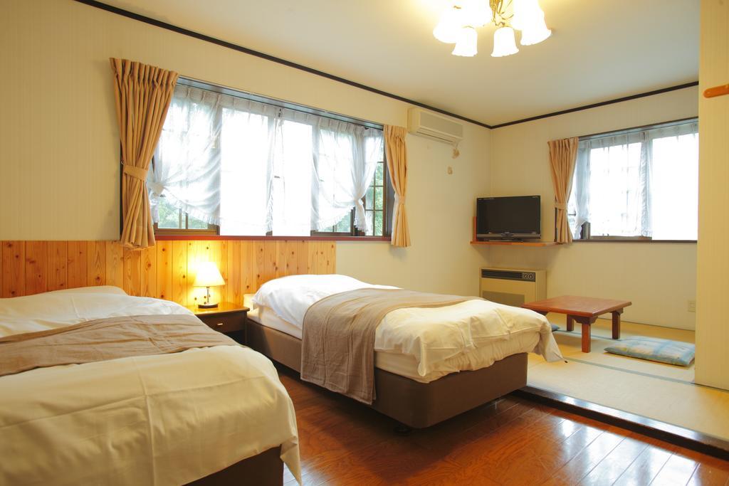 Hakubagoryu Pension&Logcottage Arumu Exterior foto
